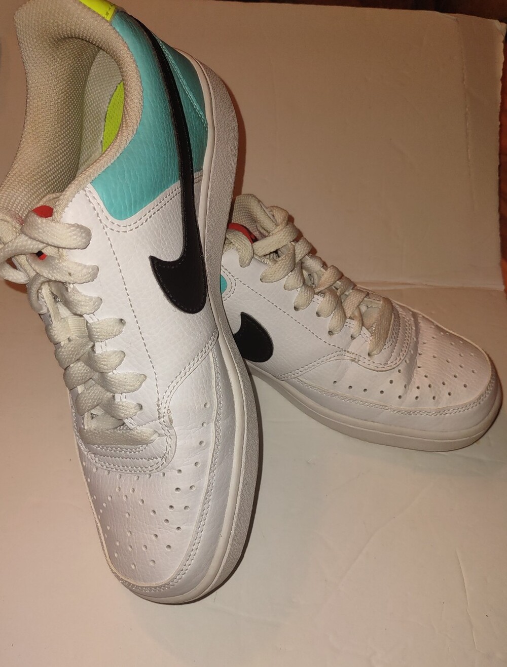 Nike Women’s White Leather Sneakers with Teal Accent